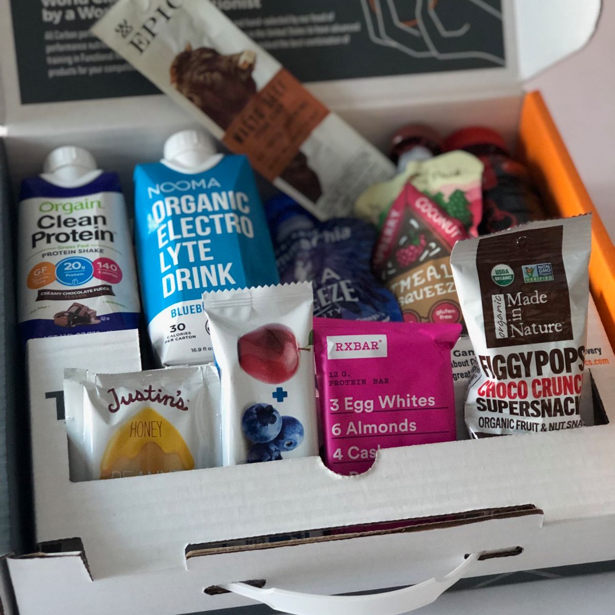 Assorted health and fitness products in a box