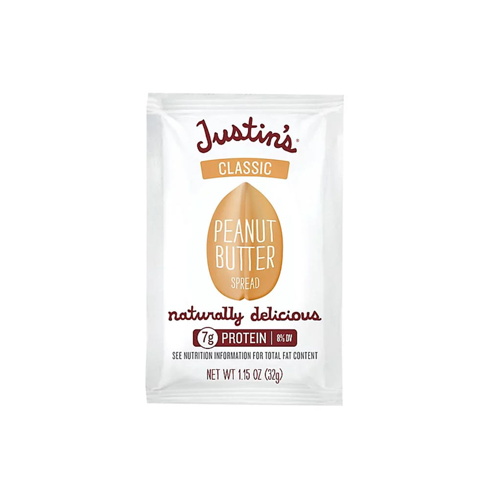 Justin's Classic Peanut Butter spread packet on a white background